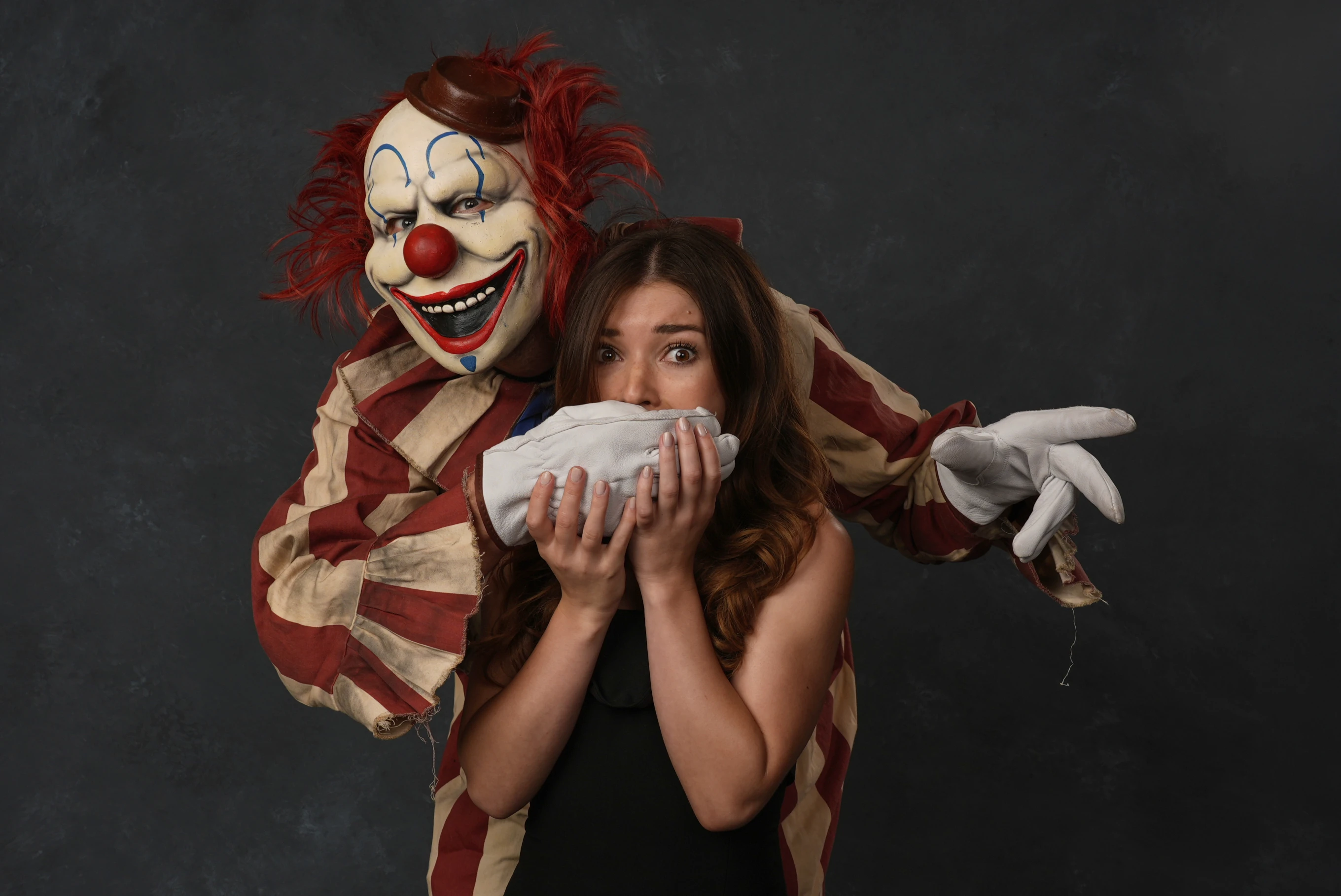 A person dressed as the character Frendo the clown, left, and Katie Douglas pose for a portrait to promote “Clown in a Cornfield” during Comic-Con International on Friday, July 25, 2025, in San Diego. (AP Photo/Chris Pizzello)