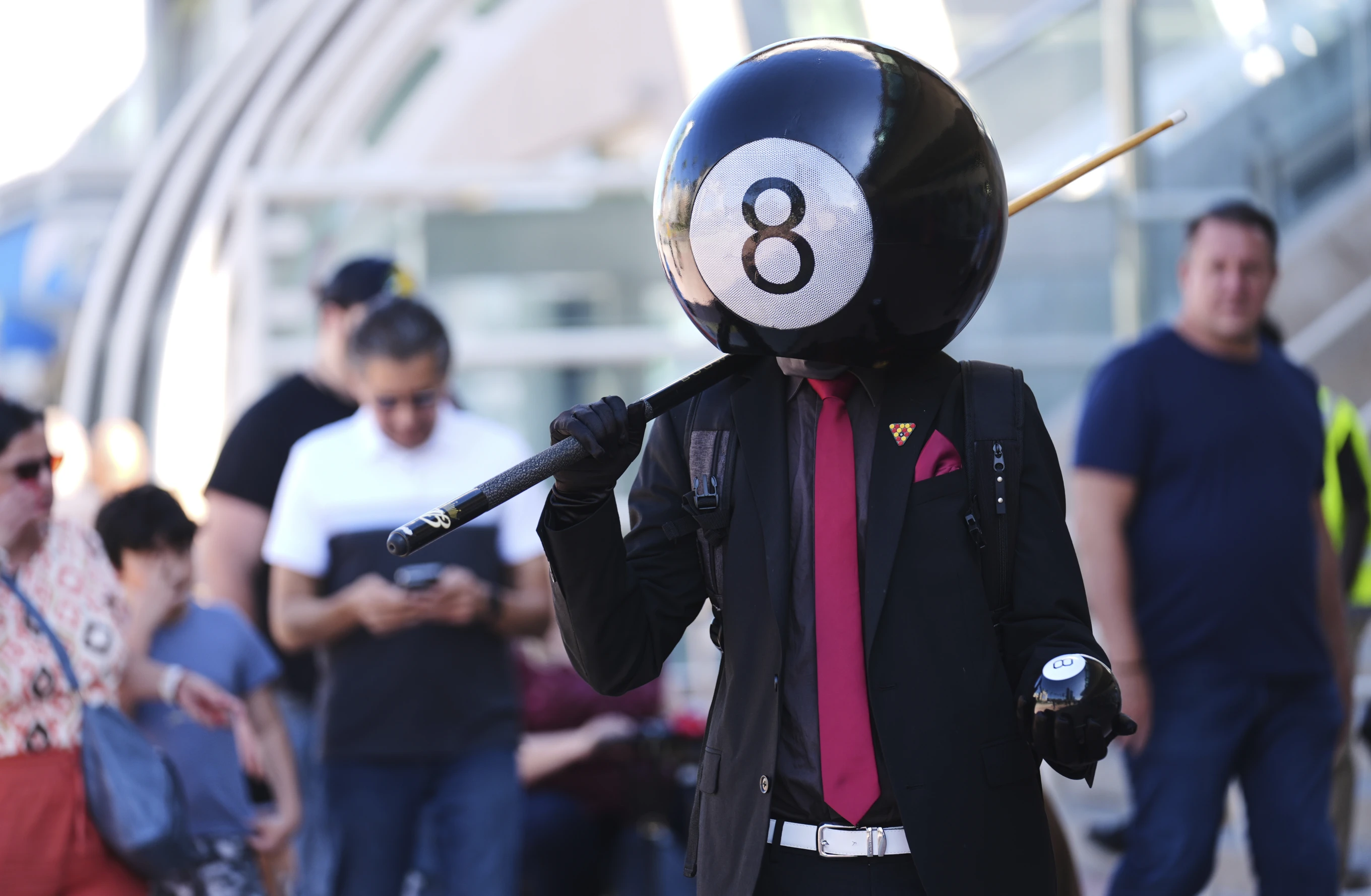 Andrew Ghannadian, of San Diego, dressed in his own costume as “Eight-ball,” walks through the crowd before the 2025 Comic-Con International Preview Night on Wednesday, July 23, 2025, in San Diego. (AP Photo/Chris Pizzello)