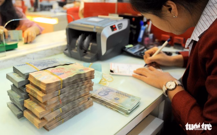 Một ngân hàng 'cắt phăng' gần 2.000 nhân sự sau 6 tháng - Ảnh 2.