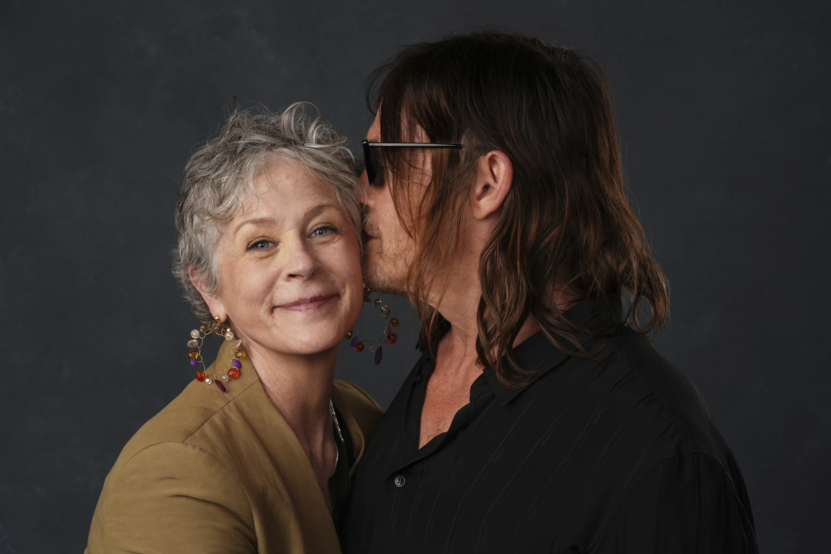 Melissa McBride, left, and Norman Reedus pose for a portrait to promote “The Walking Dead: Daryl Dixon” during Comic-Con International on Friday, July 25, 2025, in San Diego. (AP Photo/Chris Pizzello)