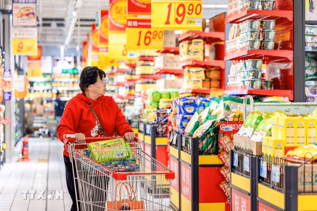 Người dân mua sắm tại siêu thị ở tỉnh Hắc Long Giang, Trung Quốc. (Ảnh: THX/TTXVN) ttxvn-kinh-te-trung-quoc.jpg