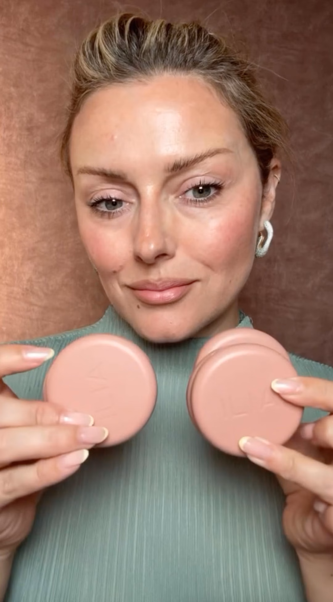 Katie Jane Huges holding up blushes