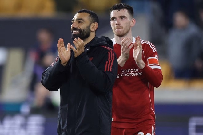 Cả Salah và Robertson đều sẽ rời Liverpool sau mùa giải năm nay. Ảnh: AFP