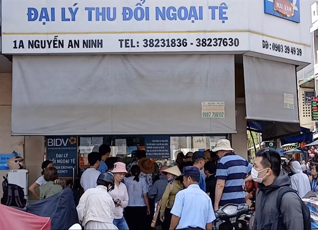 Những nơi được phép đổi USD Các điểm thu đổi ngoại tệ chính thức đều có bảng hiệu theo quy định