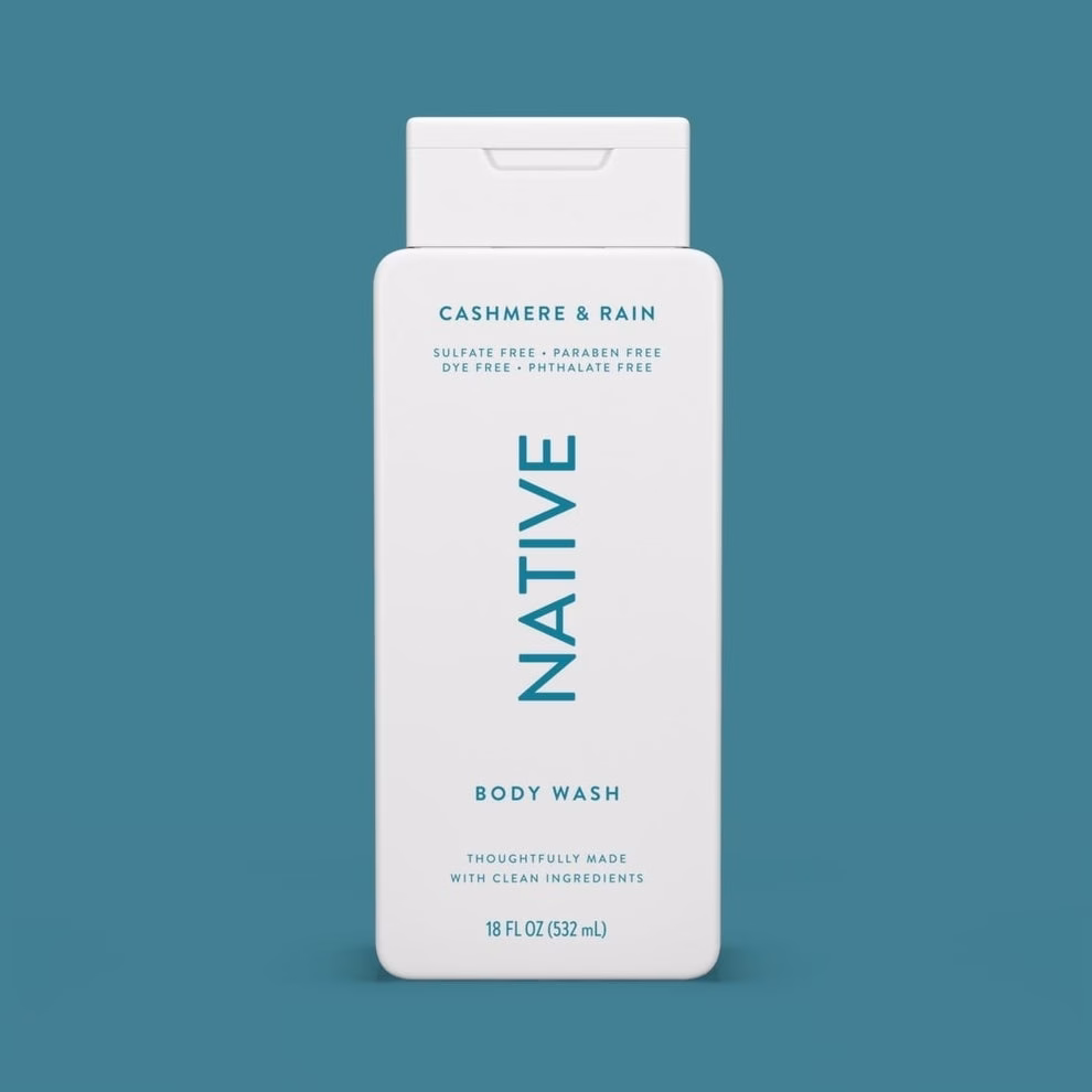 Native Cashmere &amp;amp; Rain body wash bottle on teal background. Label highlights: sulfate-free, paraben-free, dye-free, phthalate-free, 18 fl oz