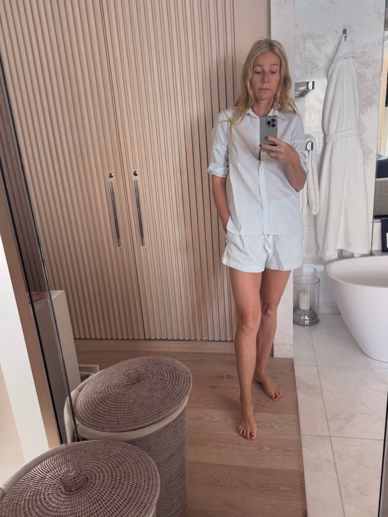 gwyneth paltrow wearing pjs in a bathroom