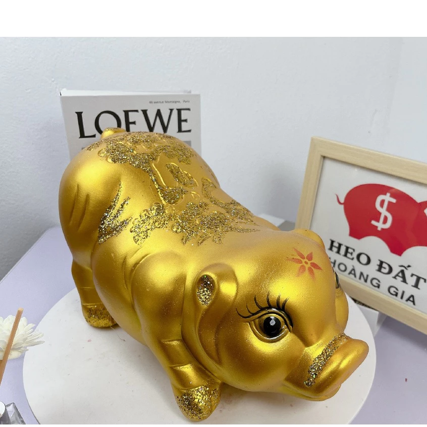 Làm thế nào để chọn heo đất tiết kiệm phù hợp với phong thủy để thu hút tài lộc?