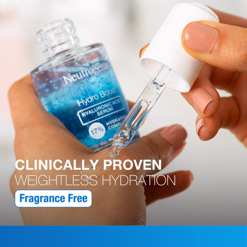 3 sản phẩm chăm sóc da và môi giúp giảm đỏ, làm mịn và cấp ẩm Person using a dropper to apply Neutrogena Hydro Boost serum from a bottle. Text highlights "Clinically Proven Weightless Hydration, Fragrance Free."