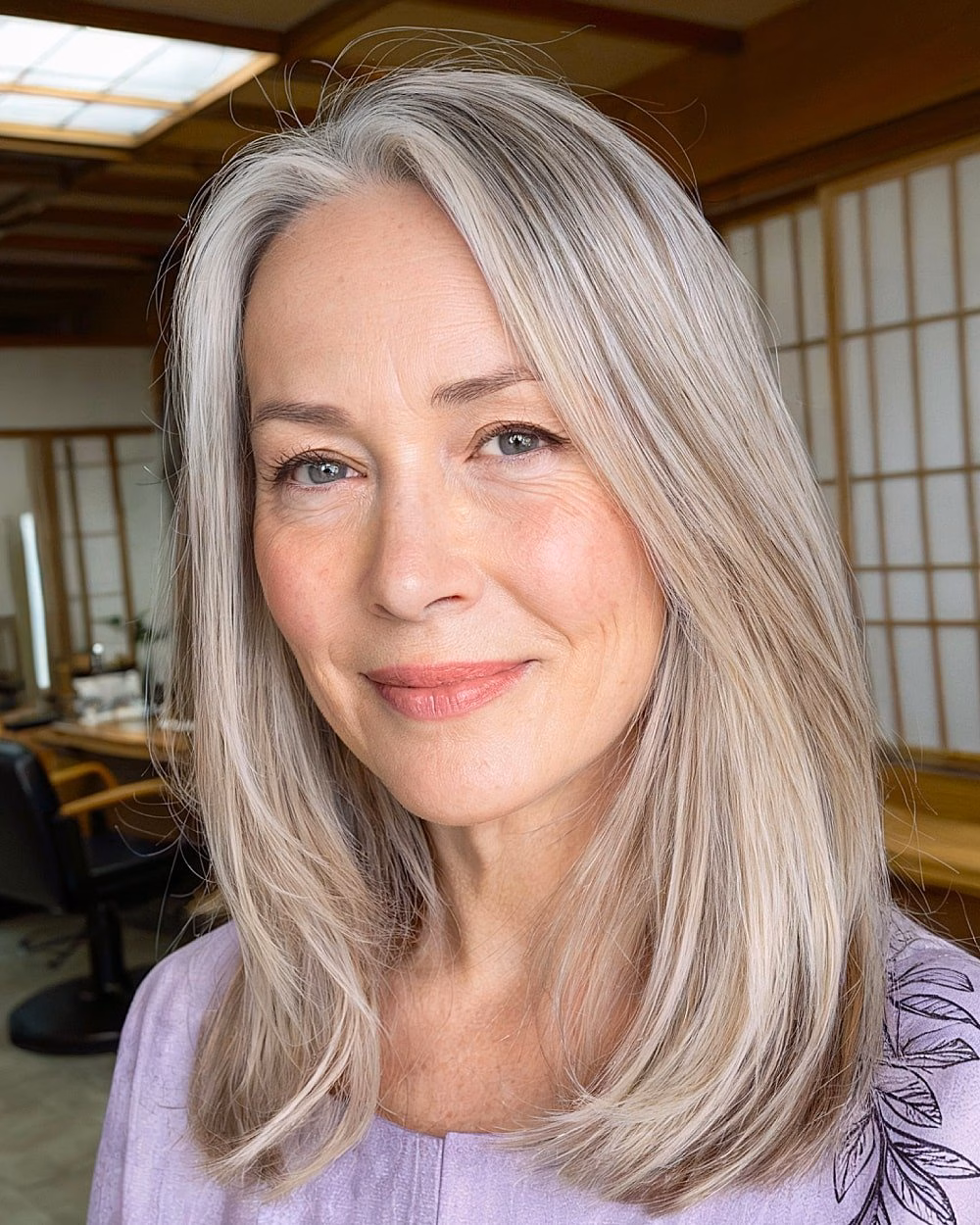 Cắt tóc layer trung giúp chị em U60 trẻ trung, khí chất Straight medium-length haircut with long layers and side part for women over 60