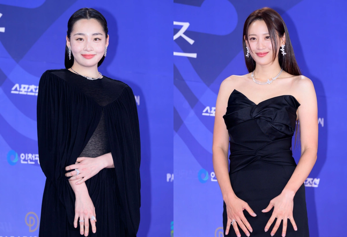 Yoona diện váy cồng kềnh, vấp ngã trên thảm đỏ lễ trao giải Blue Dragon Series Cùng diện sắc đen, diễn viên Kim Min Ha (trái) chọn kiểu dáng có phần kín đáo, còn người đẹp Kim Soo Hyun (Claudia Kim) ghi điểm với vẻ gợi cảm.