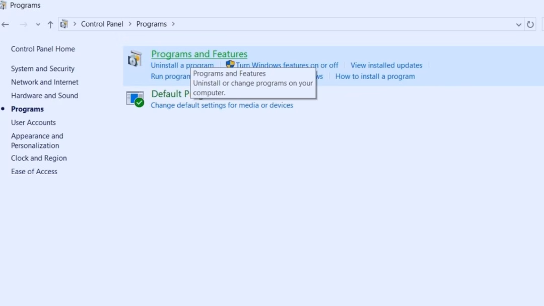 Cách gỡ bỏ Avast Free Antivirus彻底 khỏi máy tính Nhấn chọn Programs and Features để chuẩn bị gỡ phần mềm
