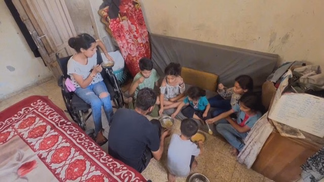 Nạn đói hoành hành ở dải Gaza - Ảnh 3.