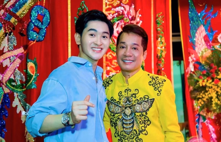Minh Nhí và con trai nuôi Minh Khải.