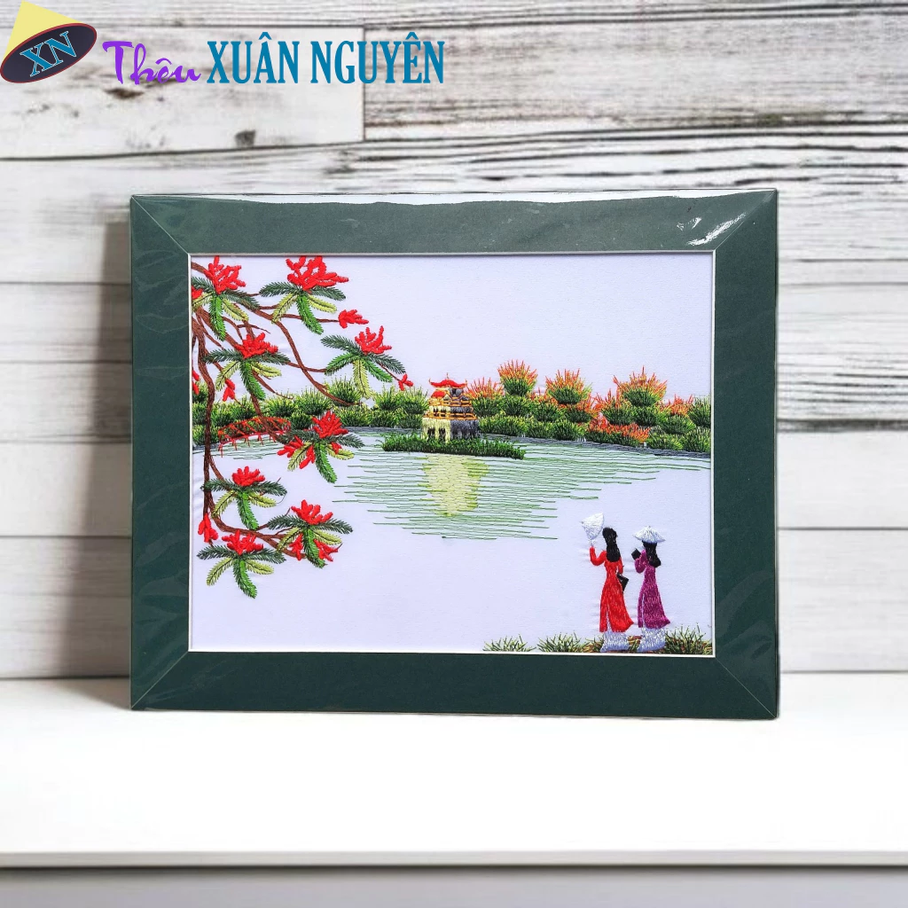 Làm thế nào để treo tranh thêu phong cảnh Việt Nam trong phòng khách mà không làm mất đi sự hài hòa của không gian?