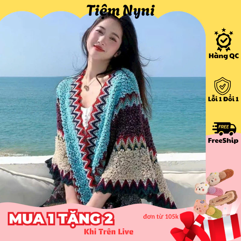 Làm thế nào để không ‘vướng’ khi mặc áo choàng kiêm khăn choàng đi du lịch?