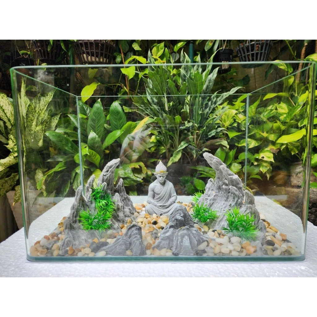 Làm thế nào để chọn bố cục hẽm núi đá tiểu cảnh trang trí bể cá phù hợp cho không gian nhỏ tại nhà?