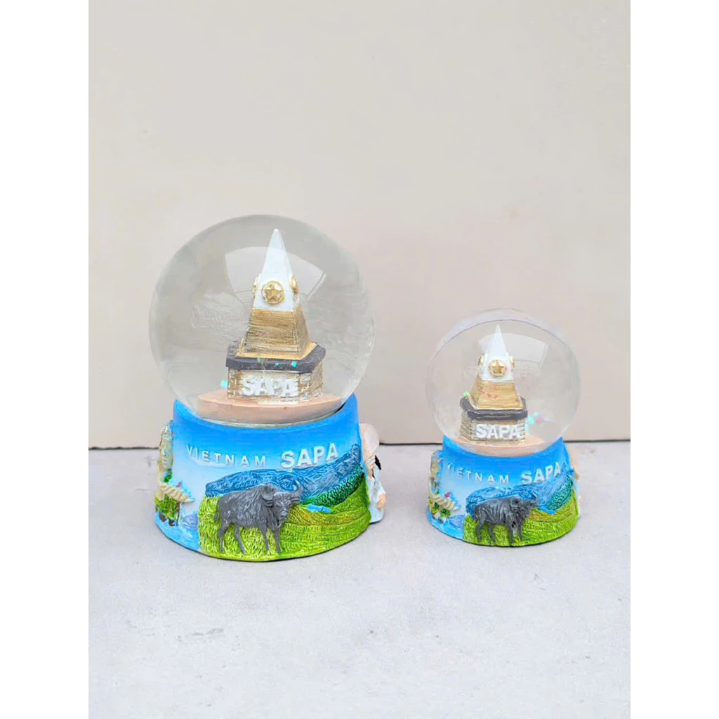 Làm thế nào để chọn quả cầu tuyết phù hợp làm quà lưu niệm cho du khách sau chuyến đi SaPa?