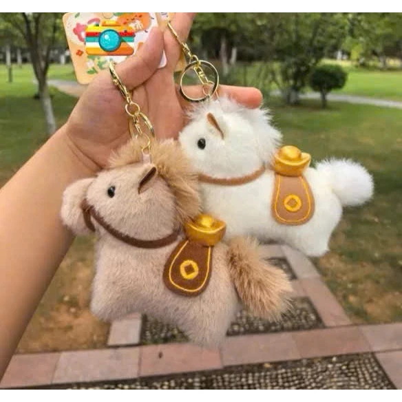 Quà tặng năm mới 2026, chiếc móc treo ba lô bông ngộ nghĩnh khiến khó khăn trong việc giữ chìa khóa ngăn nắp bộc lộ.