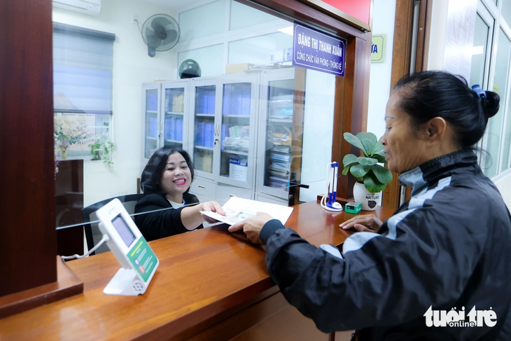 Hà Nội đẩy nhanh tiến độ chi trả cho cán bộ nghỉ việc sau sắp xếp cán bộ - Ảnh1.