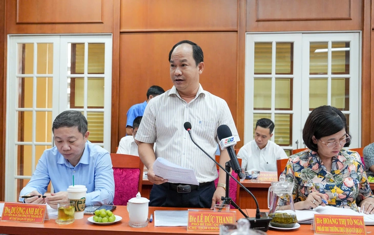 Báo cáo của Chủ tịch UBND quận 1 Chủ tịch UBND quận 1 Lê Đức Thanh báo cáo