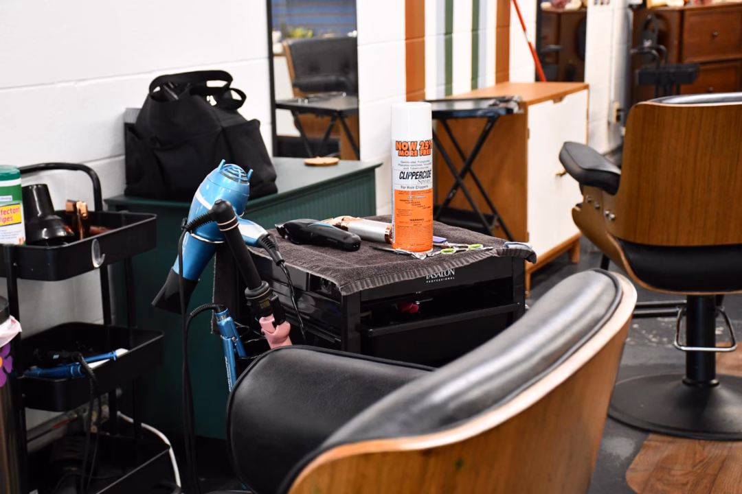 A work area inside a Mississippi cosmetology school shows the tools and training stations used by students. Educators say communication gaps and regulatory delays have created confusion for both instructors and licensees. Photo by RHCJC News