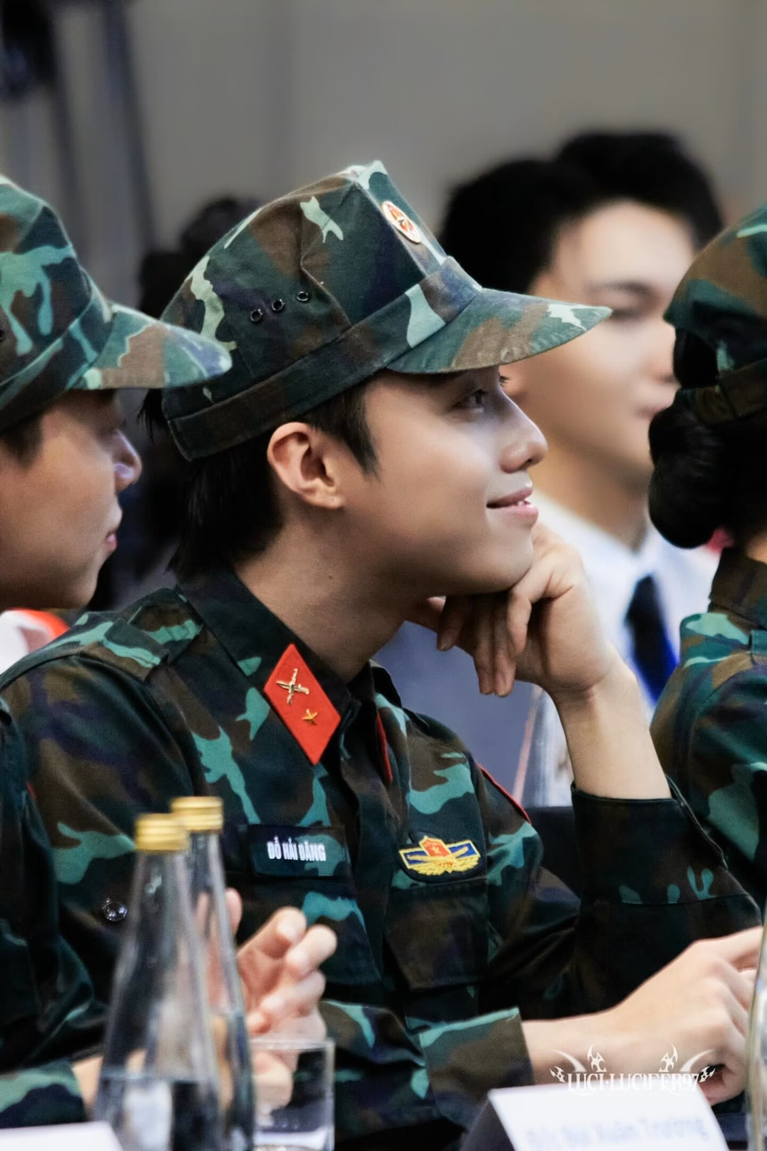 May be an image of 2 people, military uniform and text