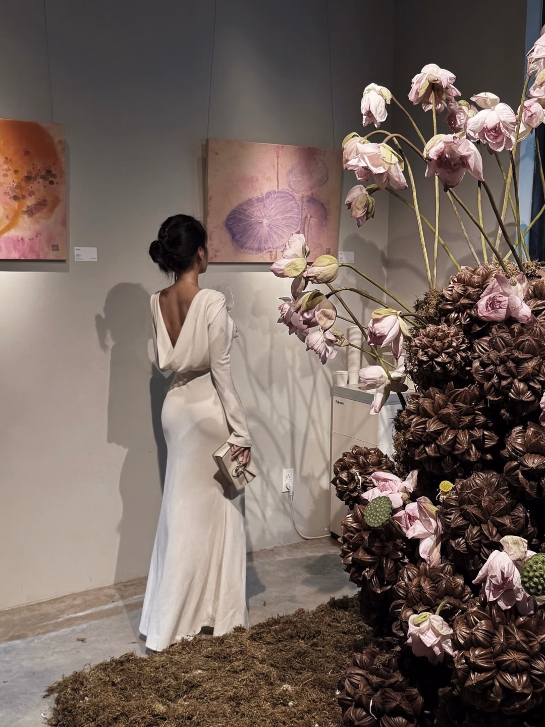 Photo by Đoan Đoan on August 02, 2025. May be an image of 1 person, bouquet, flower arrangement, gown and text.