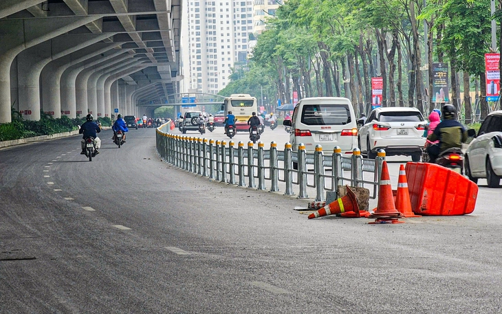 Cần tách riêng làn ô tô và xe máy - Ảnh 2.