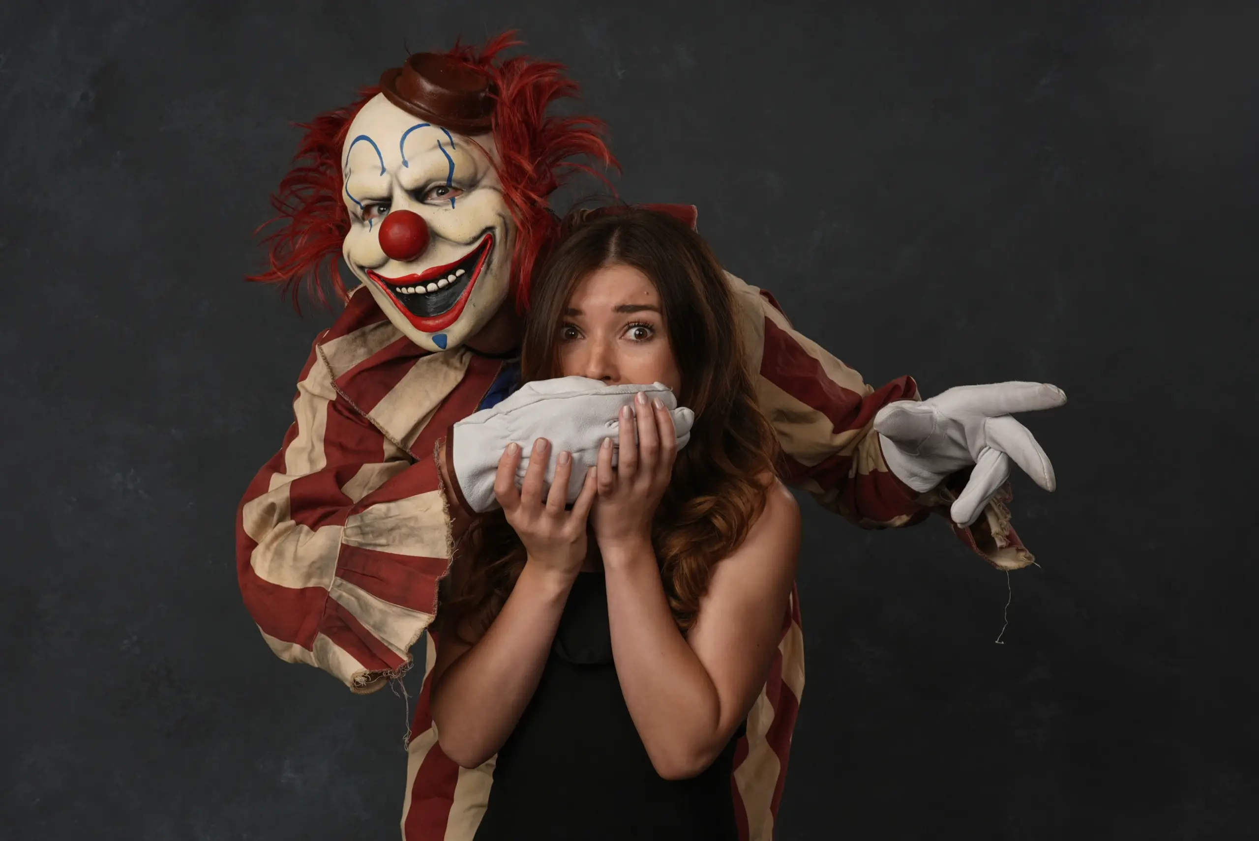 A person dressed as the character Frendo the clown, left, and Katie Douglas pose for a portrait to promote “Clown in a Cornfield” during Comic-Con International on Friday, July 25, 2025, in San Diego. (AP Photo/Chris Pizzello)