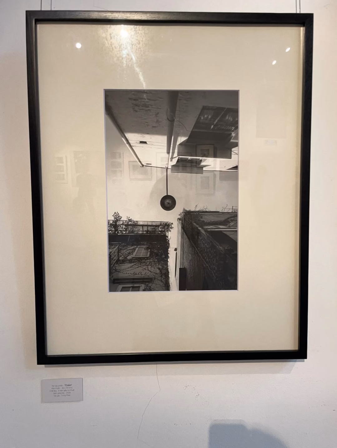 Photo by Hà Vi on August 03, 2025. May be a black-and-white image of shadow box, picture frame and text.