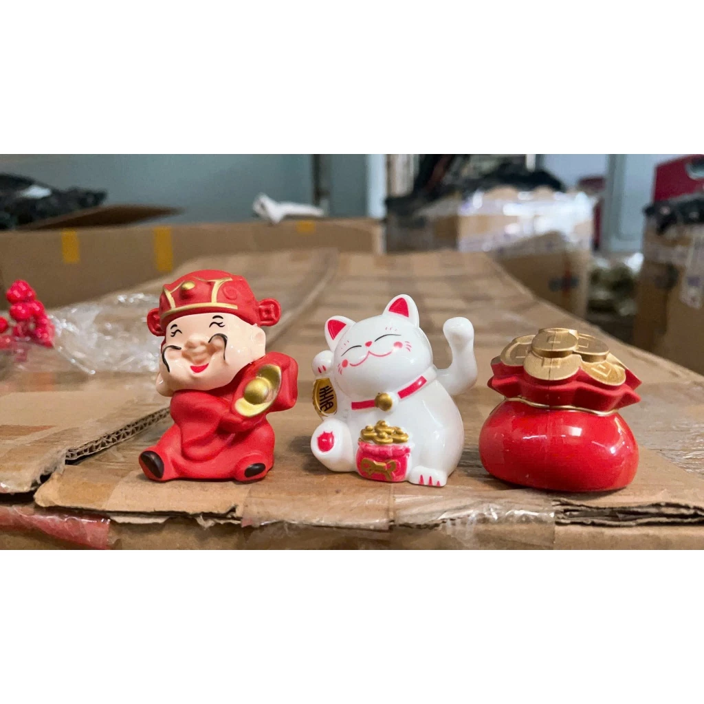 Làm thế nào để chọn mèo thần tài trang trí giỏ quà Tết phù hợp và ý nghĩa của nó trong văn hóa Việt Nam