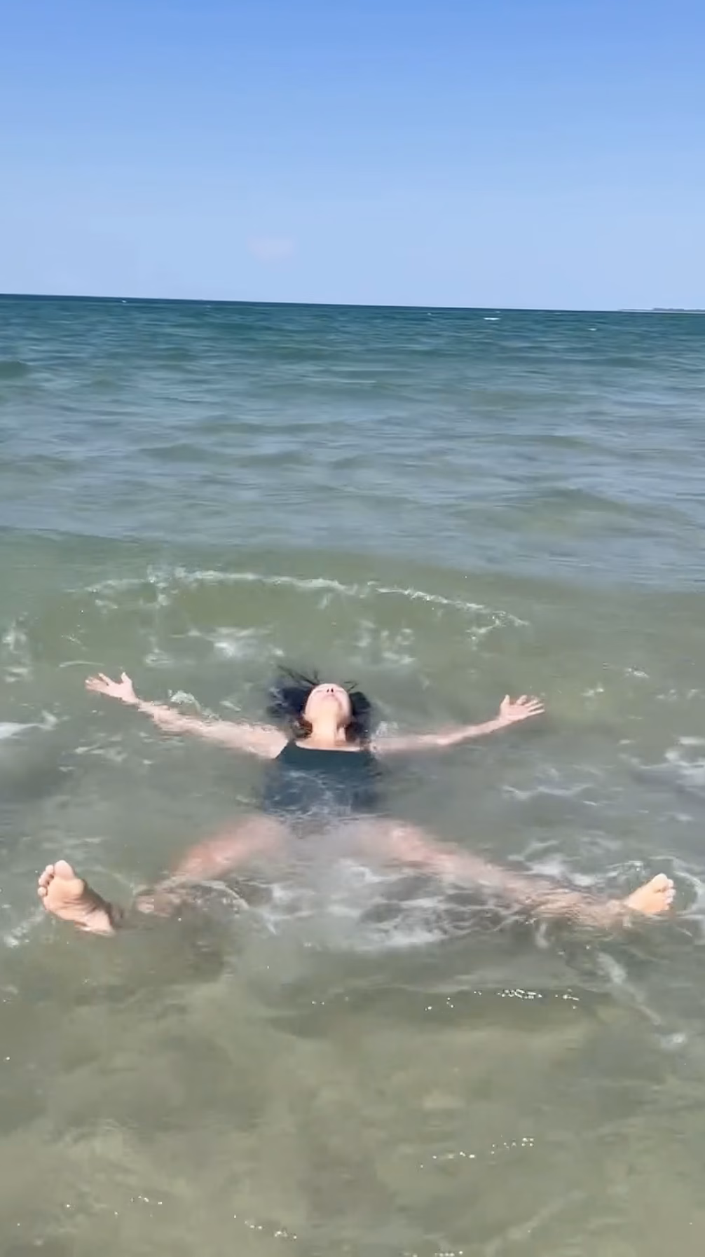 Ashley Judd in the body-positive video flopping in the water