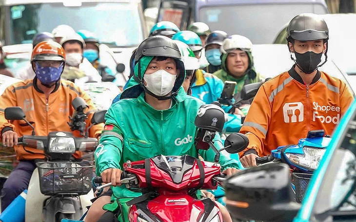 Chuyển đổi 400.000 xe shiper và tài xế công nghệ sang xe điện: Khó khăn và giải pháp Mong chính sách phù hợp để tài xế mạnh dạn chuyển đổi - Ảnh 1.