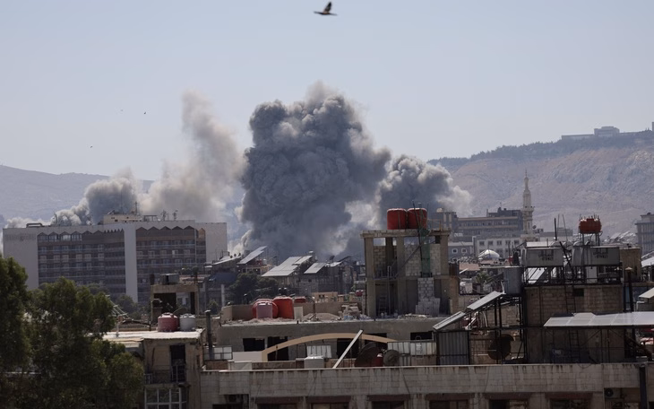 Israel và Syria đạt thỏa thuận ngừng bắn sau giao tranh ở Syria Israel và Syria đạt thỏa thuận ngừng bắn sau gần một tuần giao tranh đẫm máu - Ảnh 3.